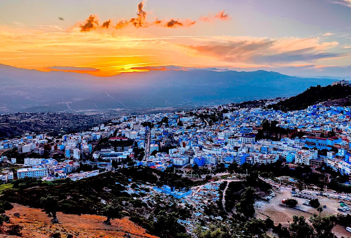 Aerial view of Chefchaouen blue city at sunset